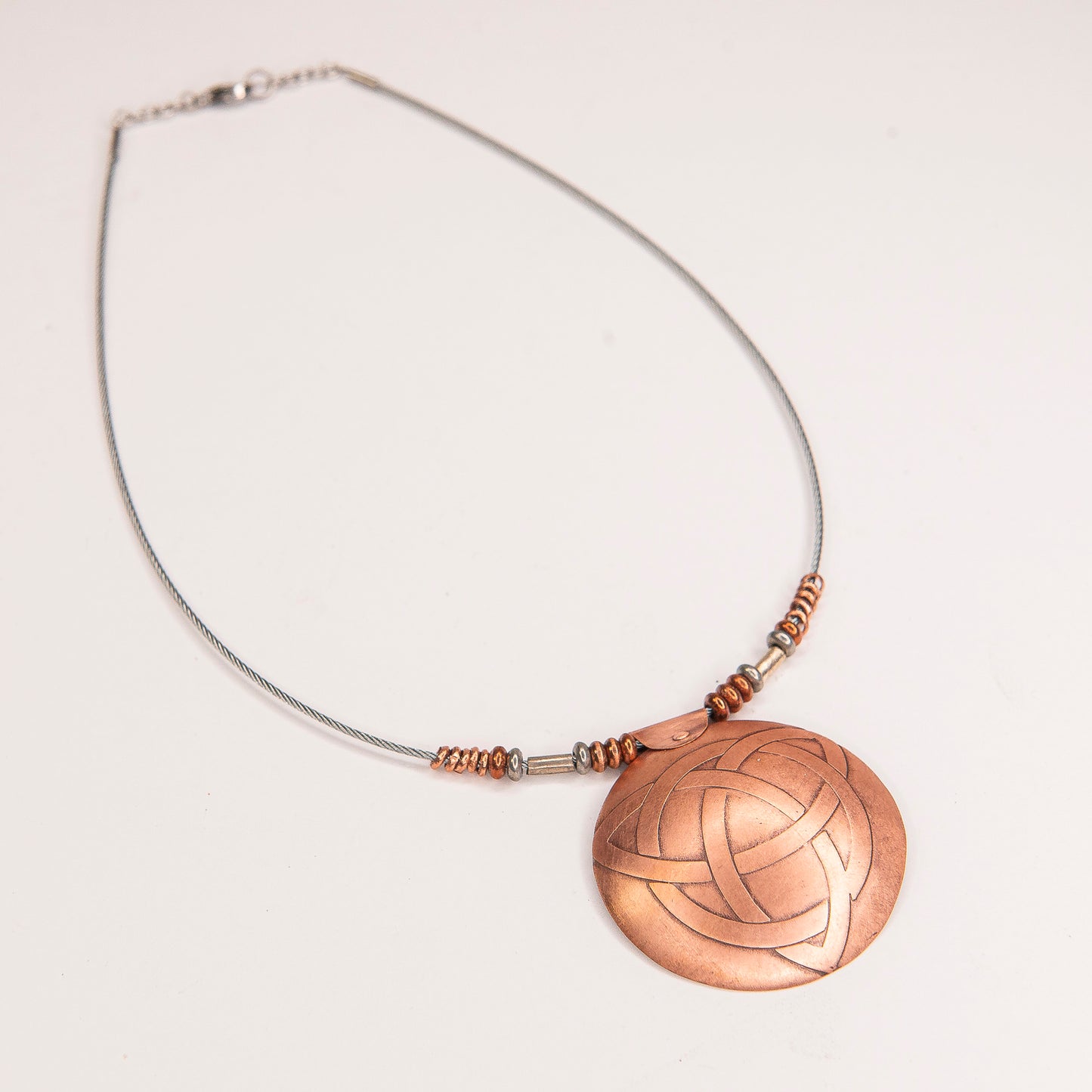 Etched Celtic Triquetra Necklace, in copper.