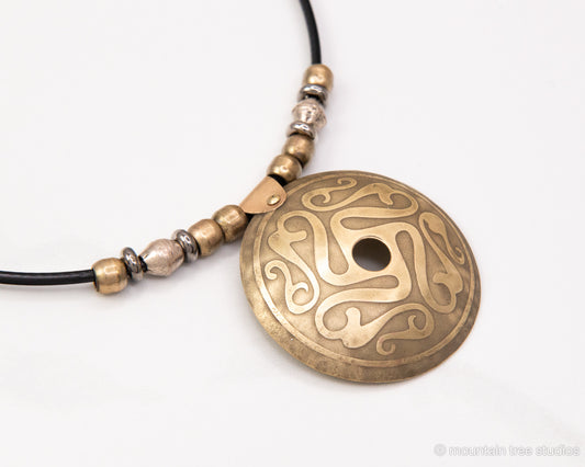 Etched Wandsworth Shield design, in brass