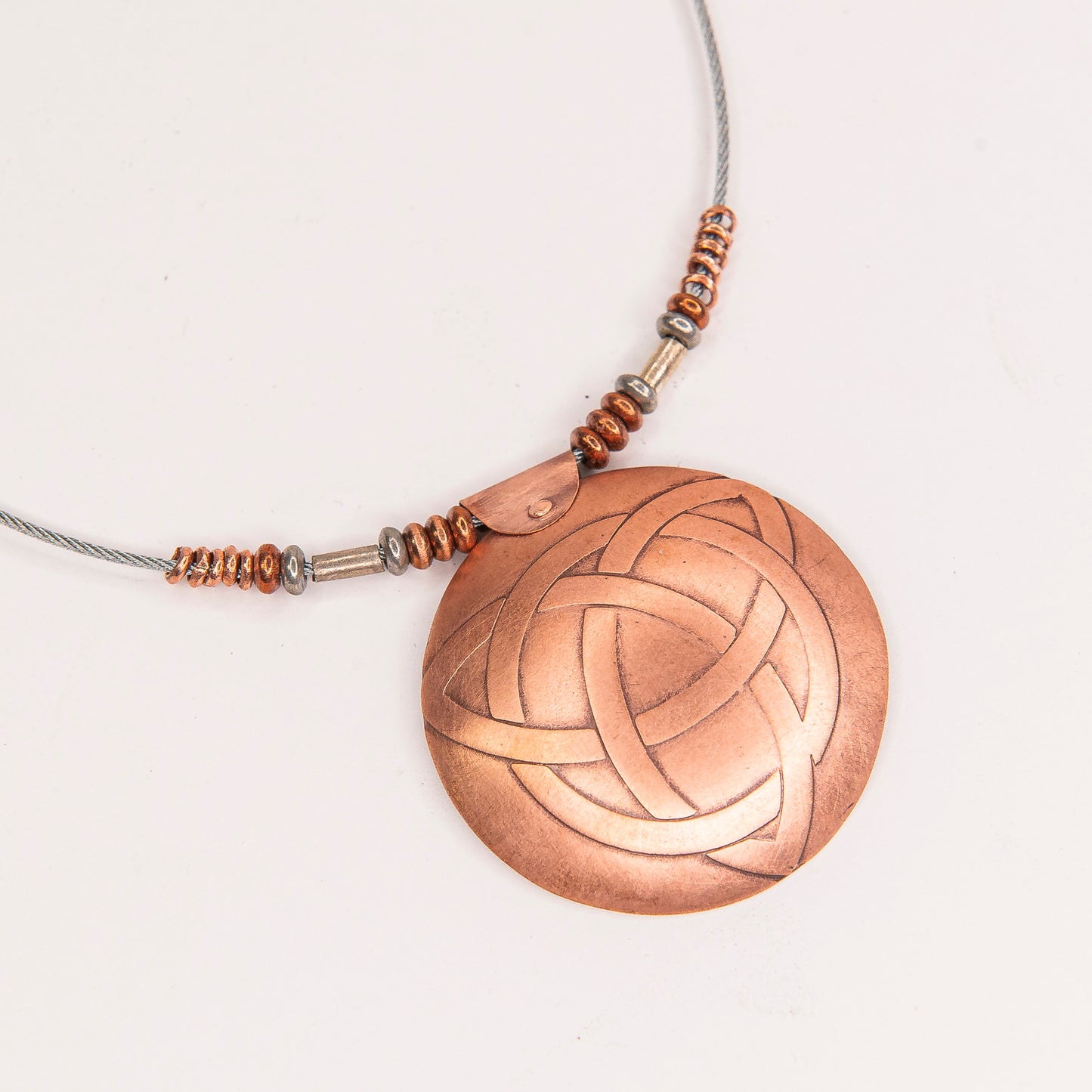 Etched Celtic Triquetra Necklace, in copper.